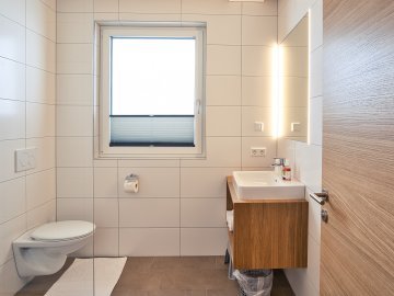 Badezimmer in den Rössle Appartements in Faschina 