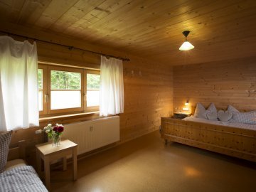 Schlafzimmer in der KnusperAlm im Bregenzerwald
